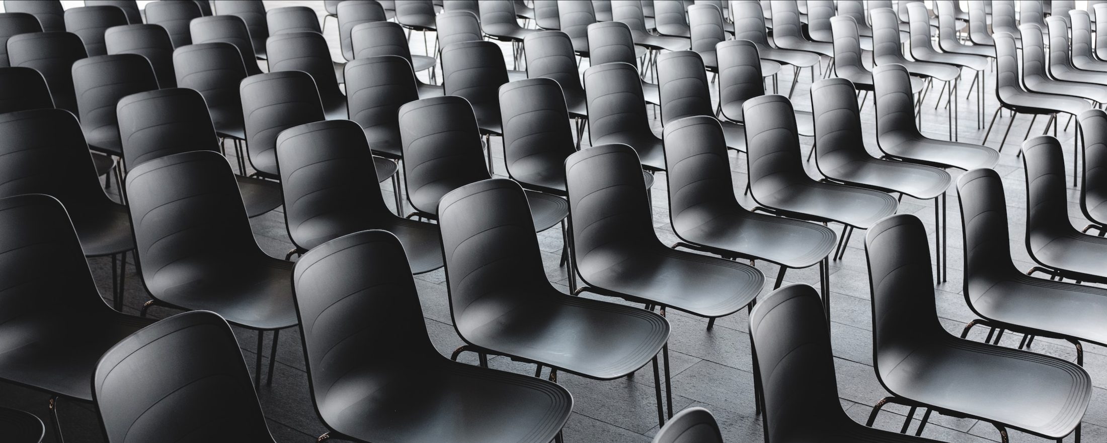 Rows of empty ceremony chairs